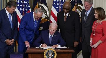 Biden signs major climate, health care and tax bill into law